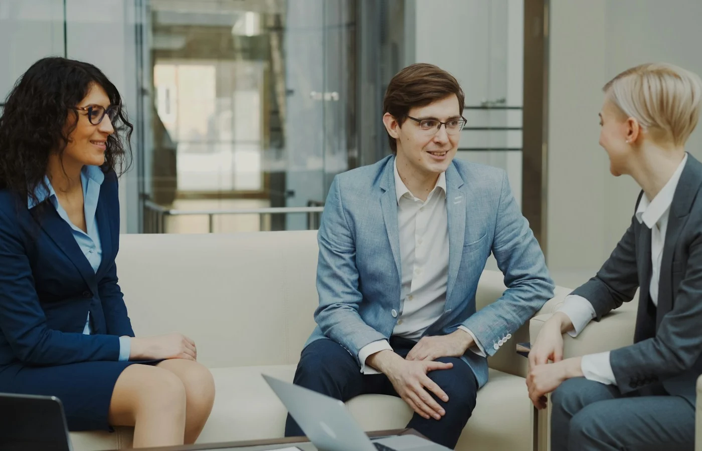 Three business people in a meeting