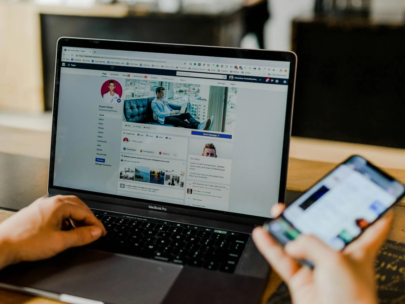 A business Facebook page open on a laptop and a smartphone